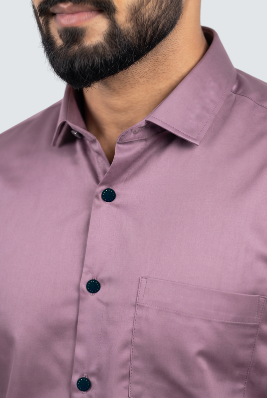 Lavender dress shirt close-up with button placket and chest pocket, dark round buttons