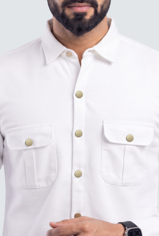 Men's white cotton lycra shirt close view, button placket and chest pockets with gold buttons