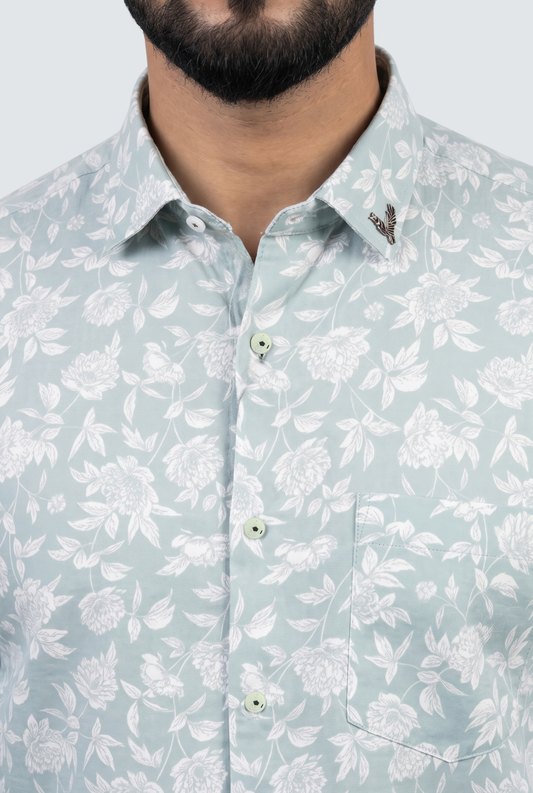 Light blue floral long-sleeve shirt close-up: collar and three-button placket