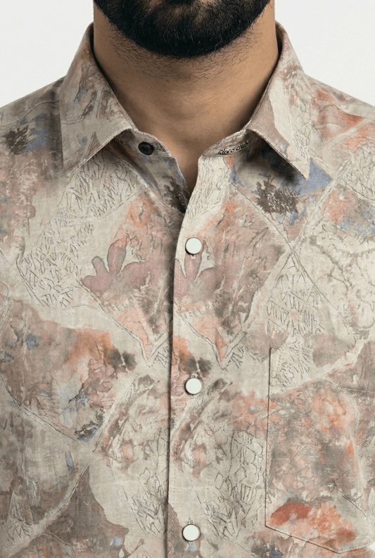 “Close-up of brown natural printed cotton shirt showcasing fabric and print details”