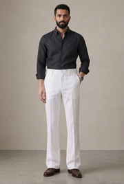 Men's white bootcut trousers with relaxed fit and button waistband