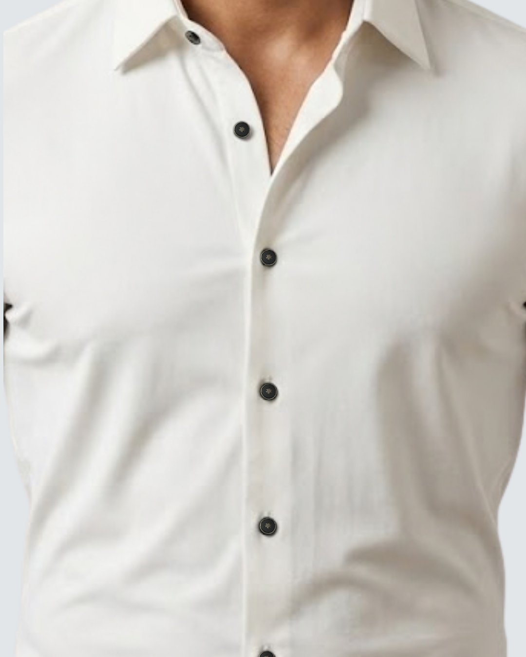 White button-up shirt with pointed collar and dark button placket