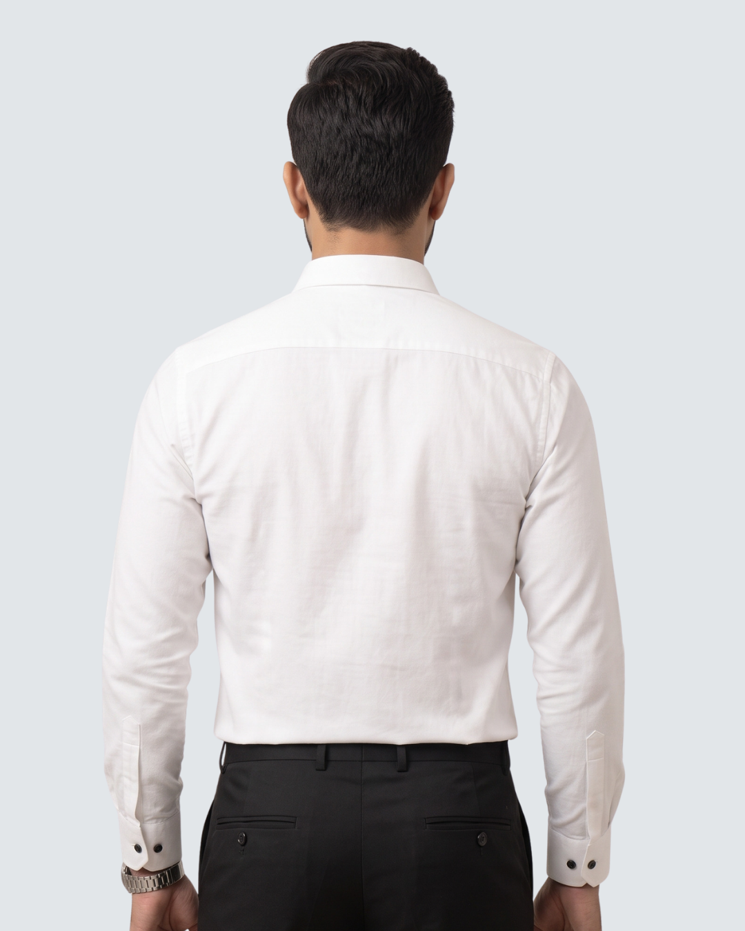White cotton button-up shirt back view with long sleeves and collar