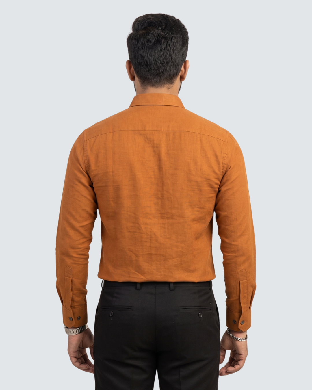 Golden-orange cotton shirt, back view with button-down collar and yoke