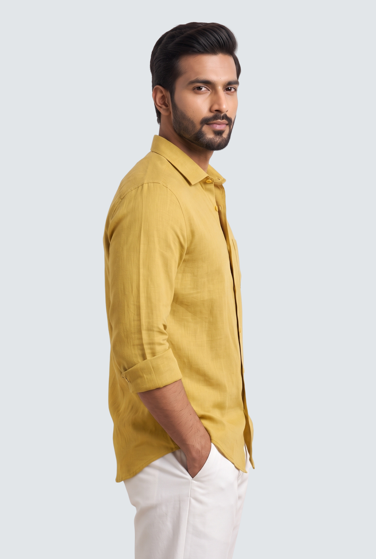 Yellow linen button-up shirt, side view with rolled sleeves and chest pocket