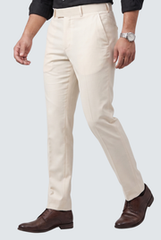 Cream regular-fit pants shown from side with tapered leg and crease details