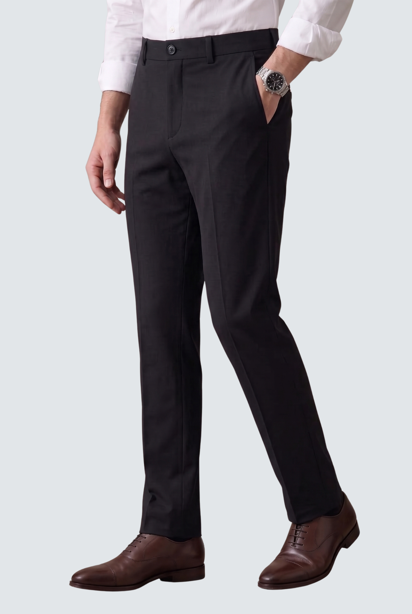 Black slim-fit trousers with side pockets and crease details