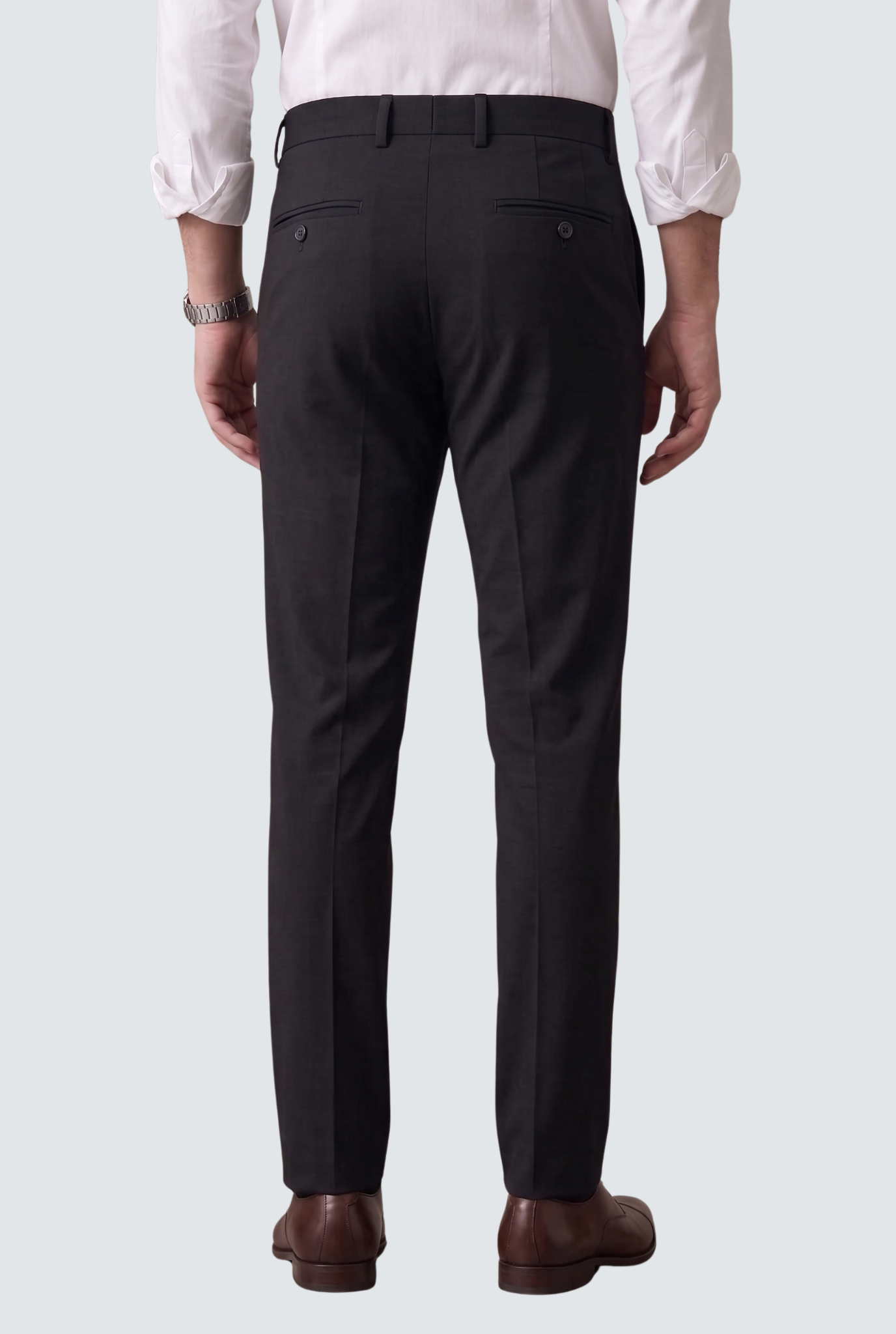 Black slim-fit trousers back view with waistband and belt loops