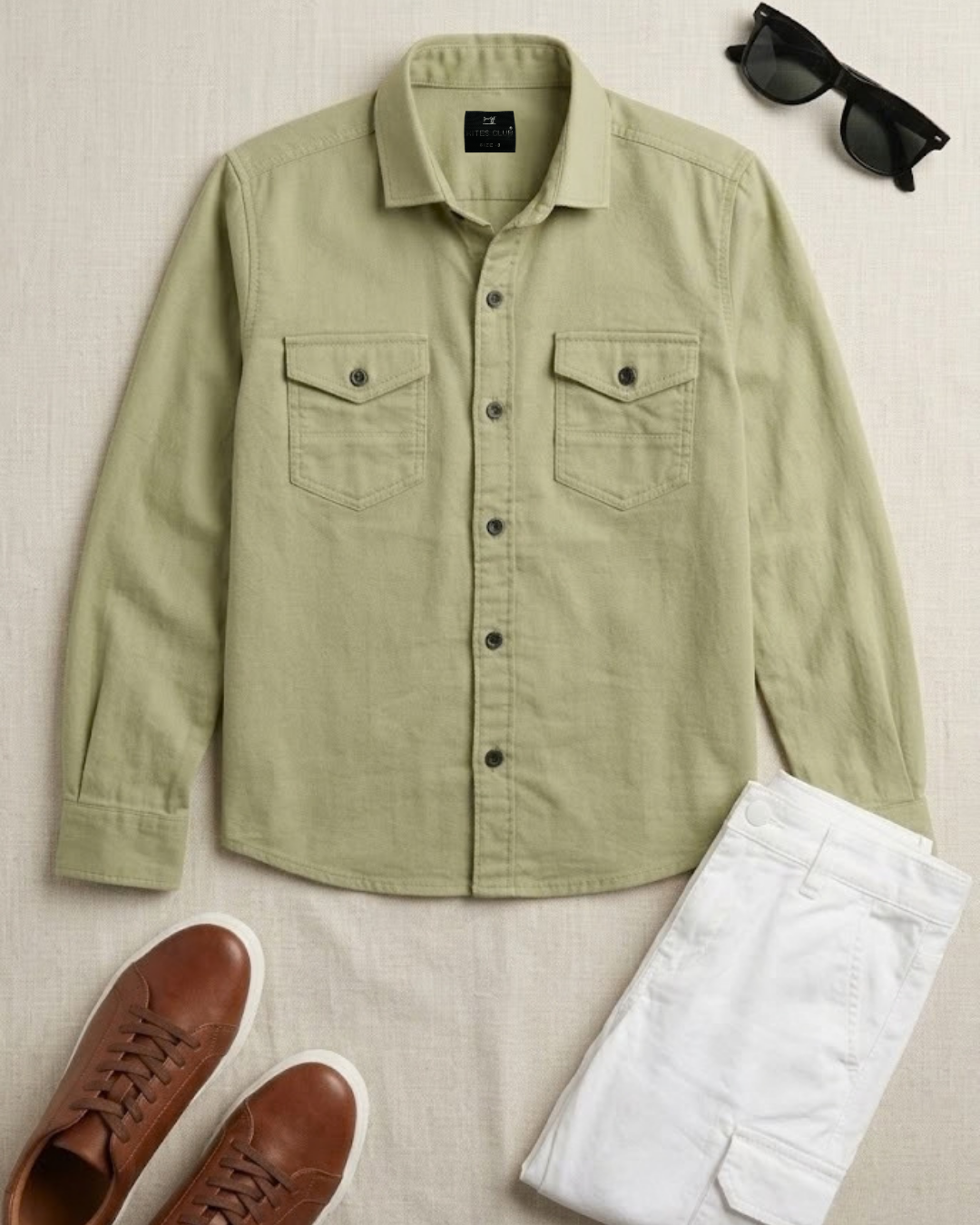 Olive green cotton button-up shirt with two chest pockets