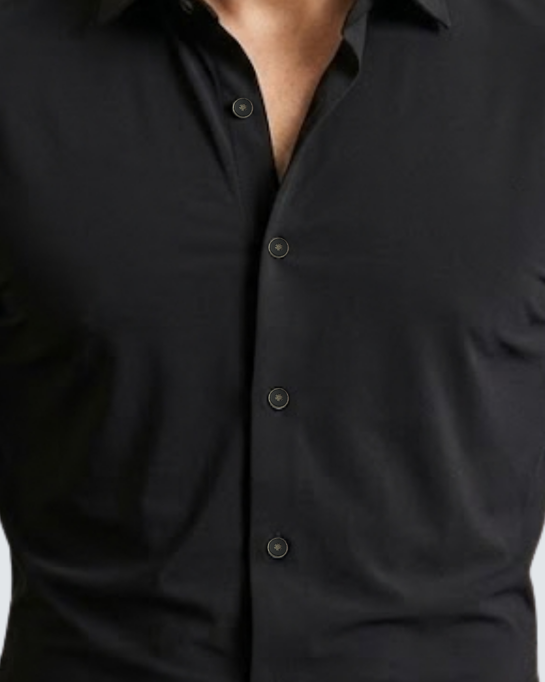 Black button-front shirt with round buttons and V-shaped neckline opening
