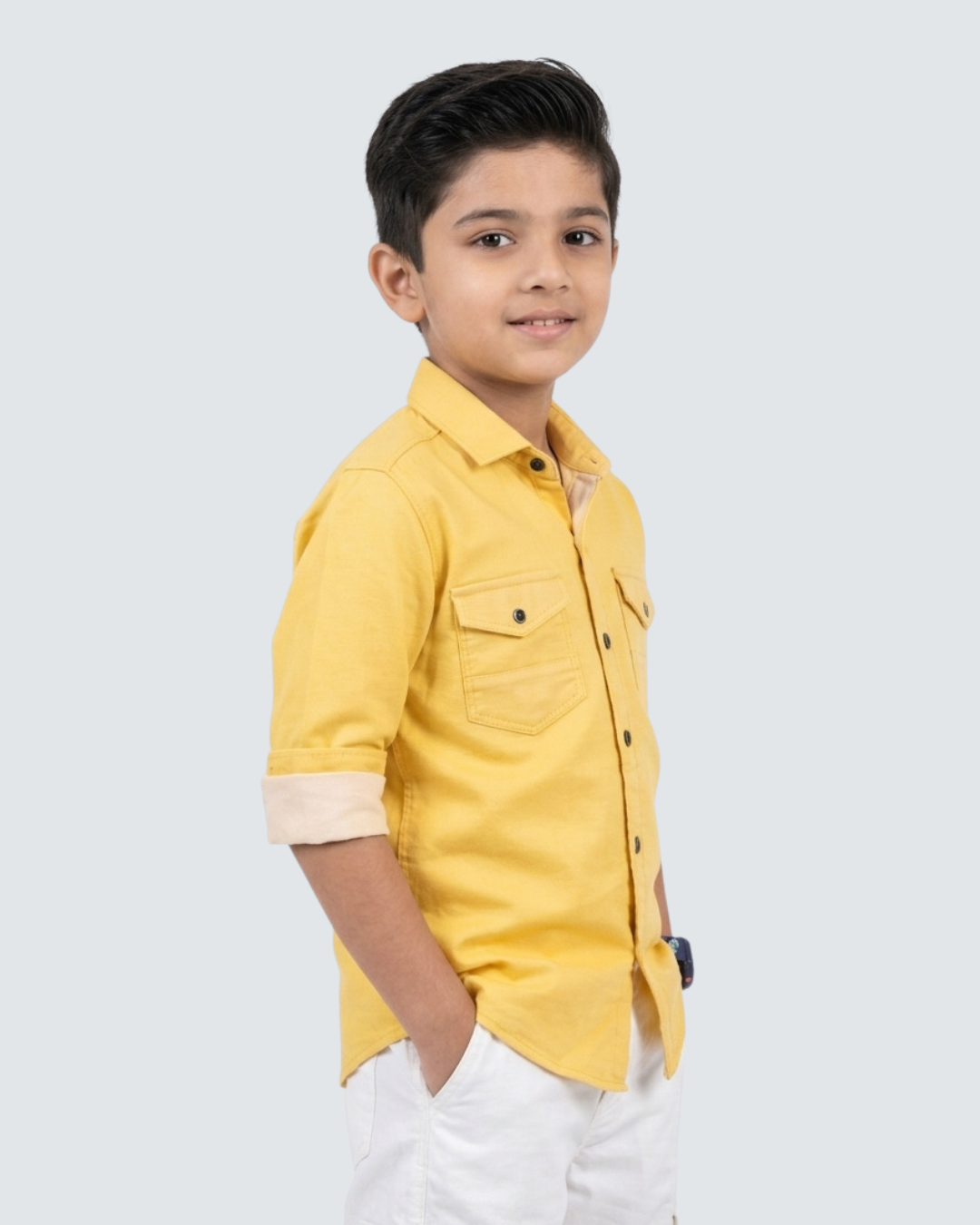 Boys yellow cotton button-up shirt with chest pockets and side seam detail