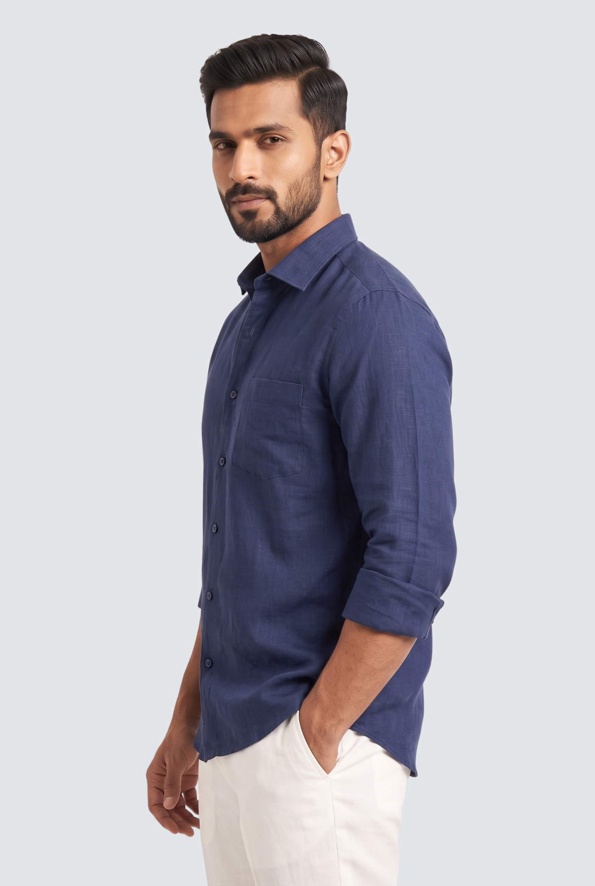 Navy linen button-up shirt, side view with long sleeves and chest pocket