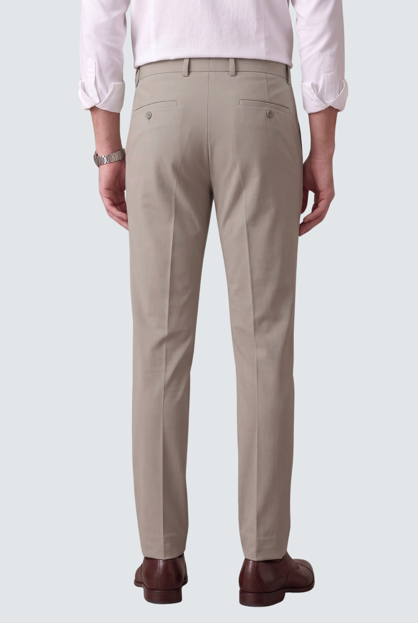Men's light grey slim-fit trousers, back view with belt loops and center seam