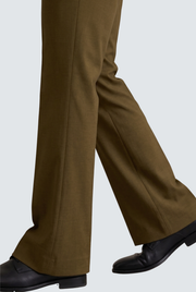 Men's brown bootcut trousers with flared hem, side angle view