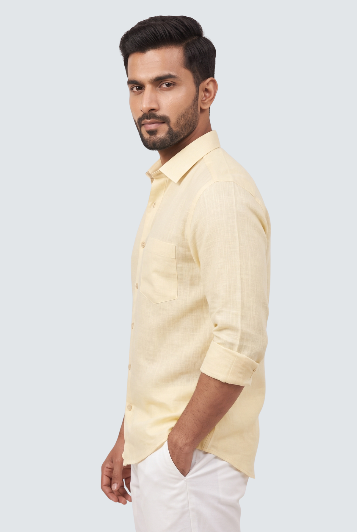 Lemon yellow linen button-up shirt, side view with rolled cuffs