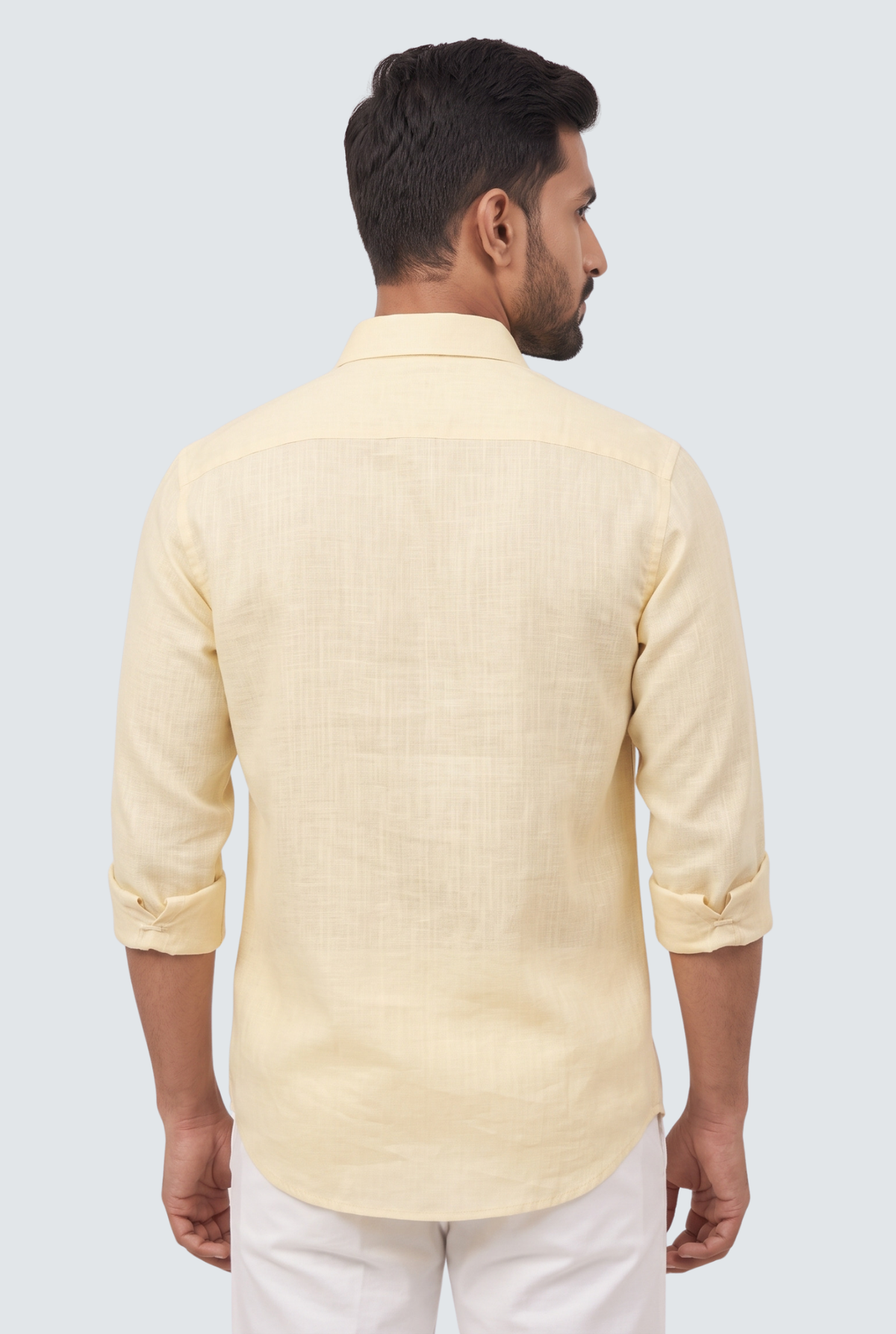 Lemon yellow linen button-up shirt, back view with yoke and sleeves