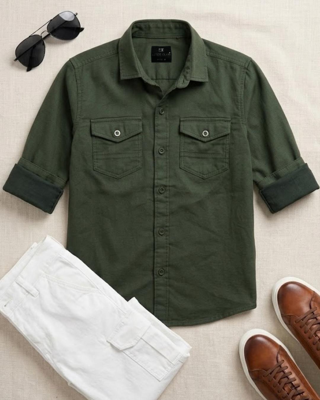 Green cotton boys button-up shirt with collar and twin chest pockets