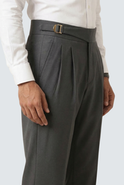 Men's dark grey trousers with pleated front and adjustable belt buckle