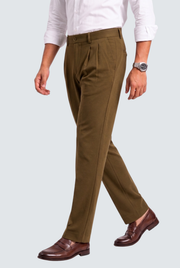 Men's brown straight-fit Gurkha trousers, side view with pleats and cuffed hem
