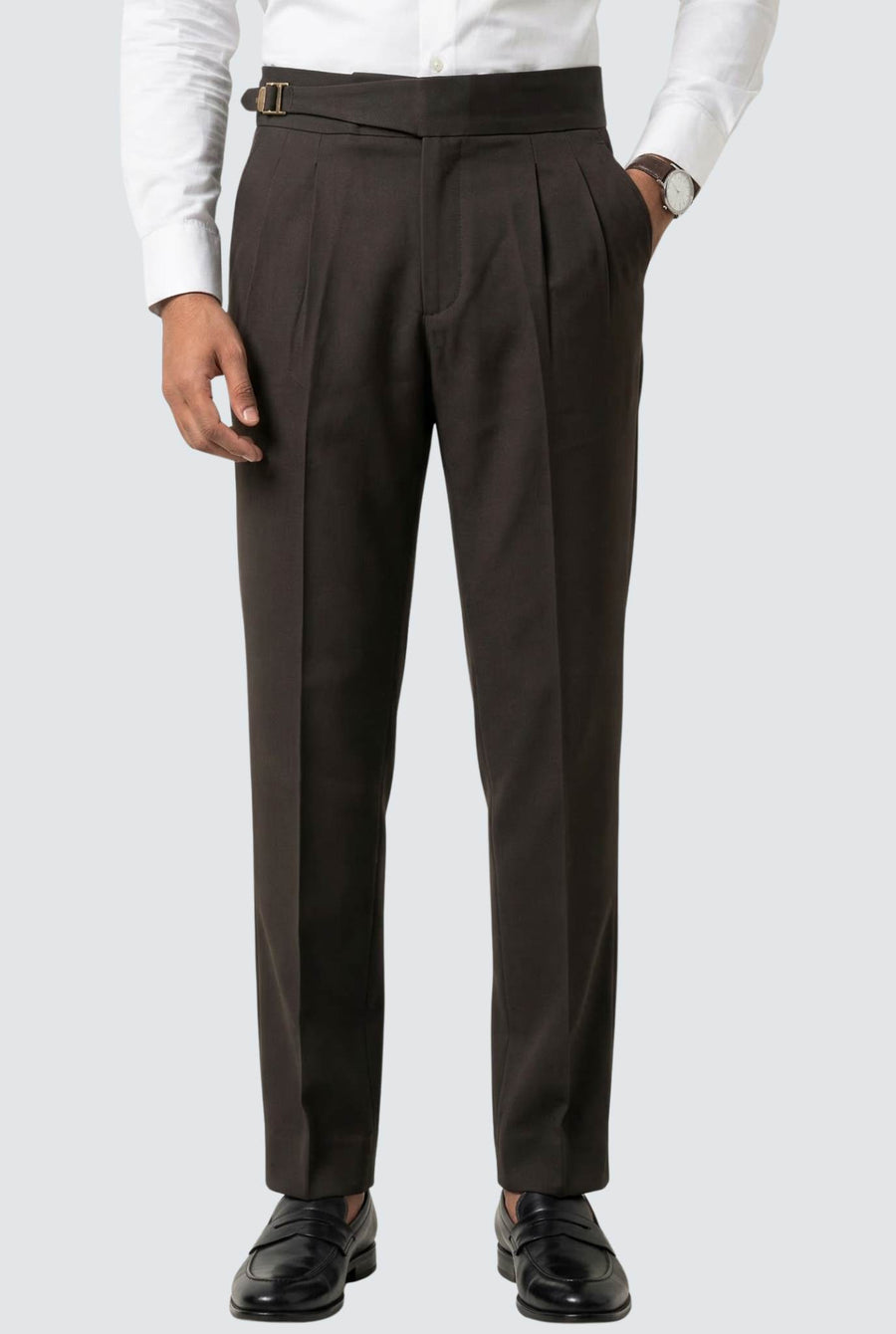 Men's brown casual trousers with pleated front, belt loops, and side pockets.