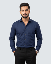Navy cotton button-up shirt with long sleeves and chest pocket
