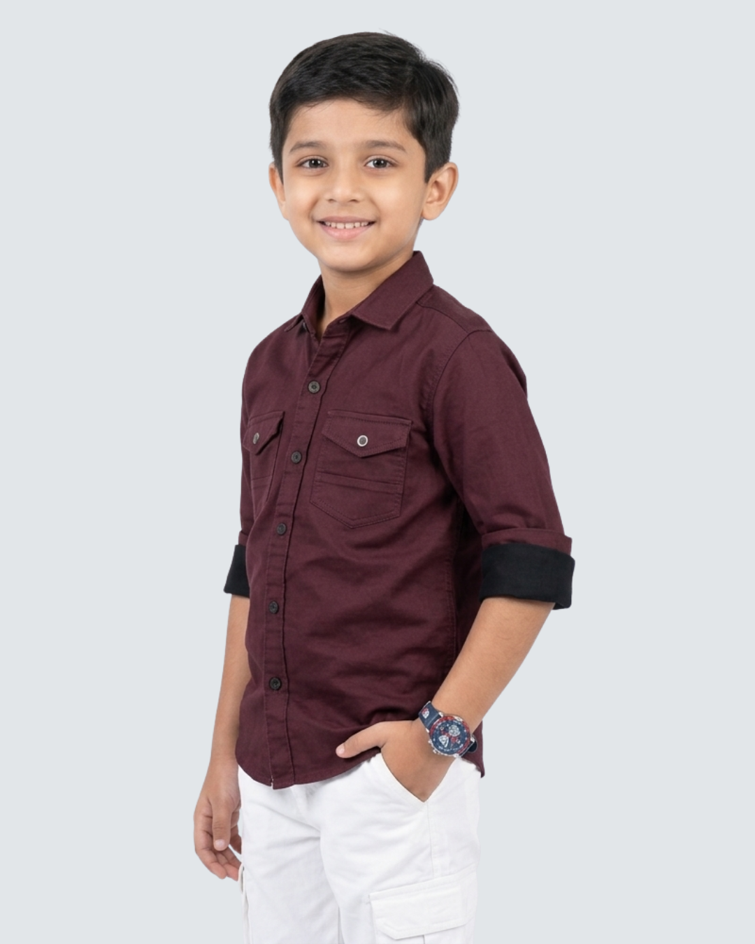 Maroon boys cotton button-up shirt with two chest pockets and dark sleeve cuffs.