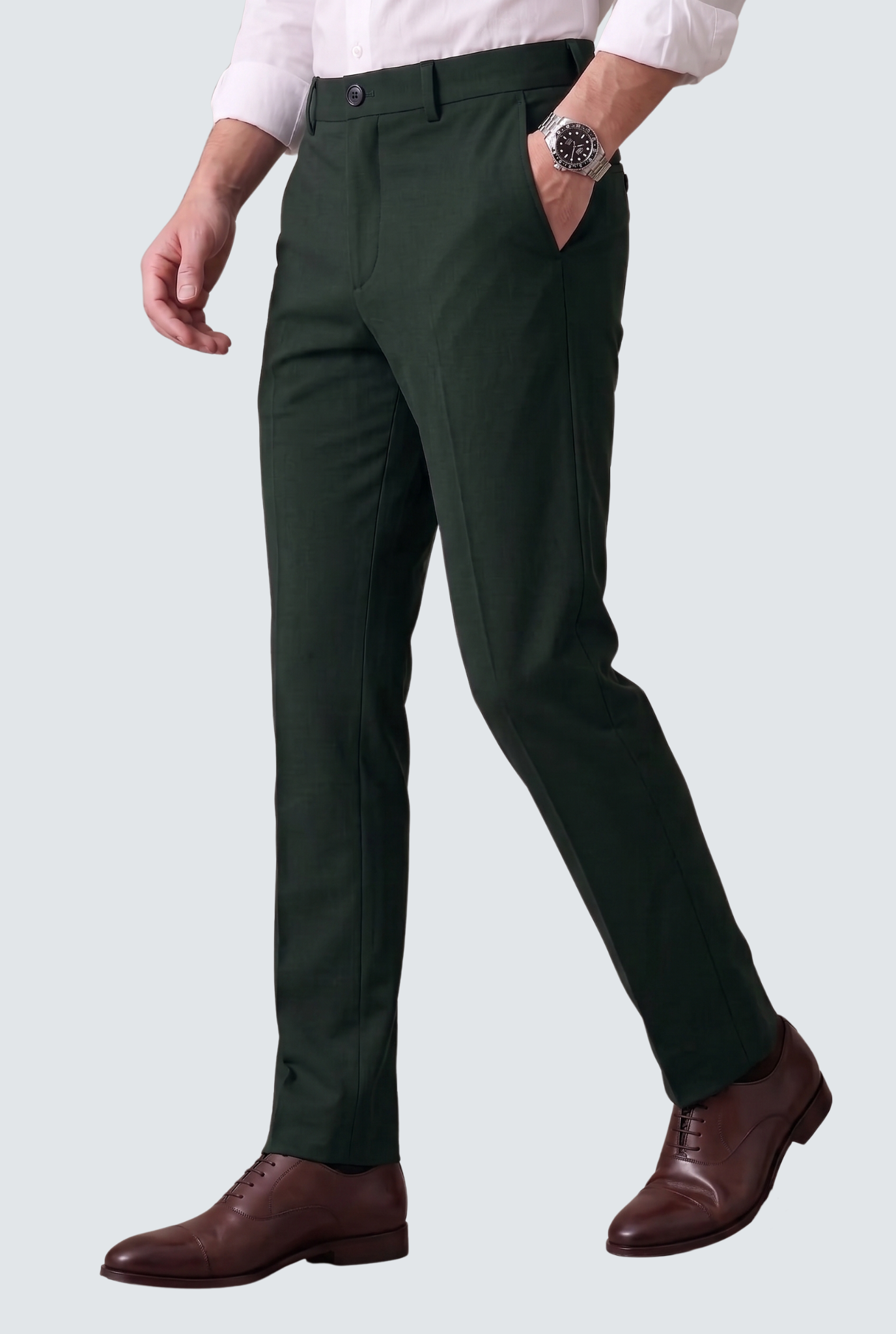 Bottle green slim-fit regular trousers with tapered legs, button waist, and side pockets.