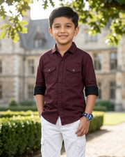 Maroon boys cotton button-up shirt with two chest pockets and dark sleeve cuffs.