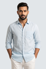 Sky blue linen button-up shirt with chest pocket and roll-cuff sleeves
