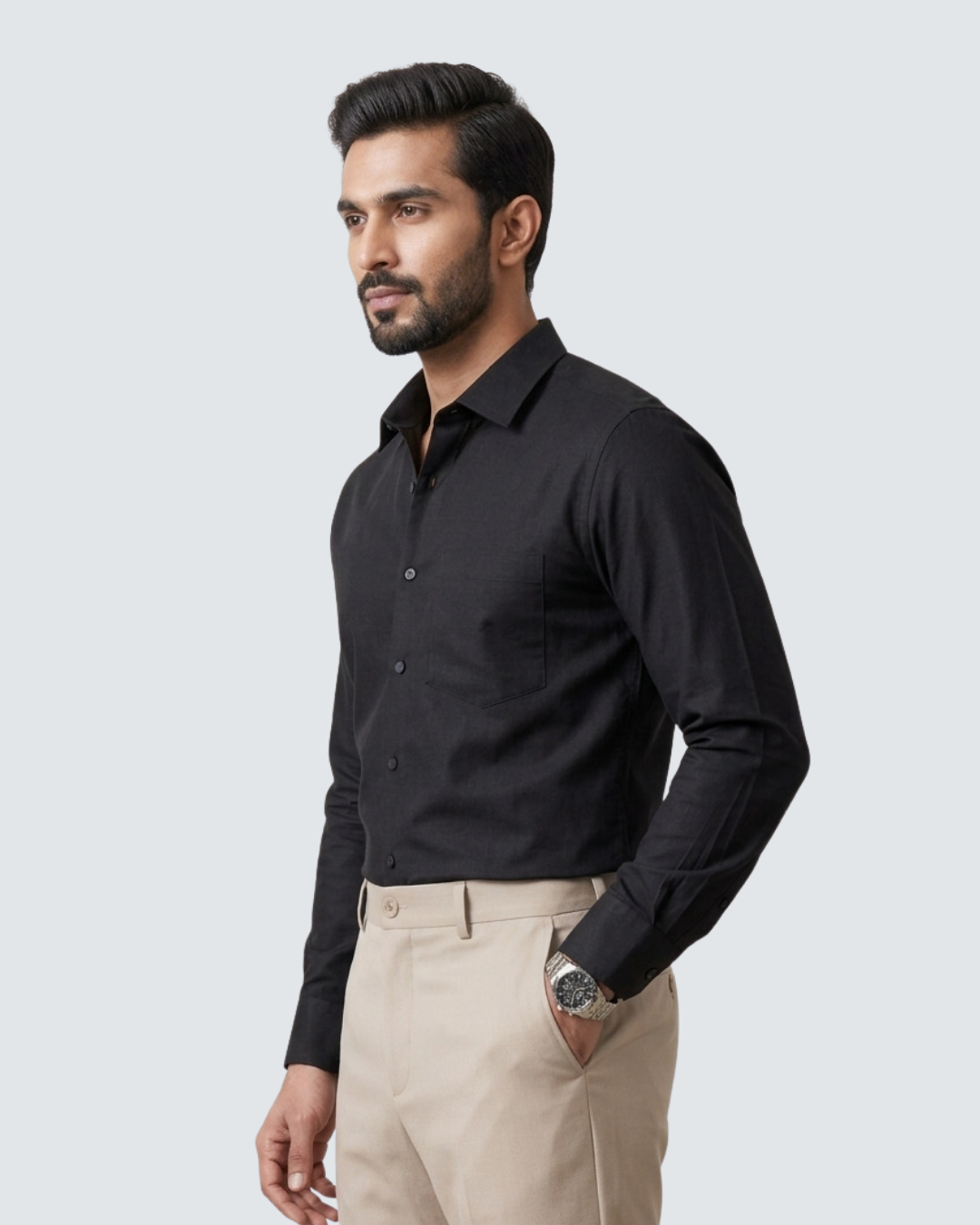 Black cotton button-front shirt with collar, long sleeves and chest pocket