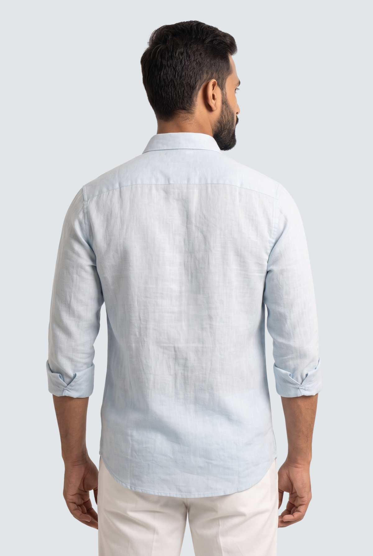 Sky blue linen button-up shirt, back view with collar and full sleeves
