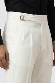 Men's white trousers with front belt buckle and pleated waist