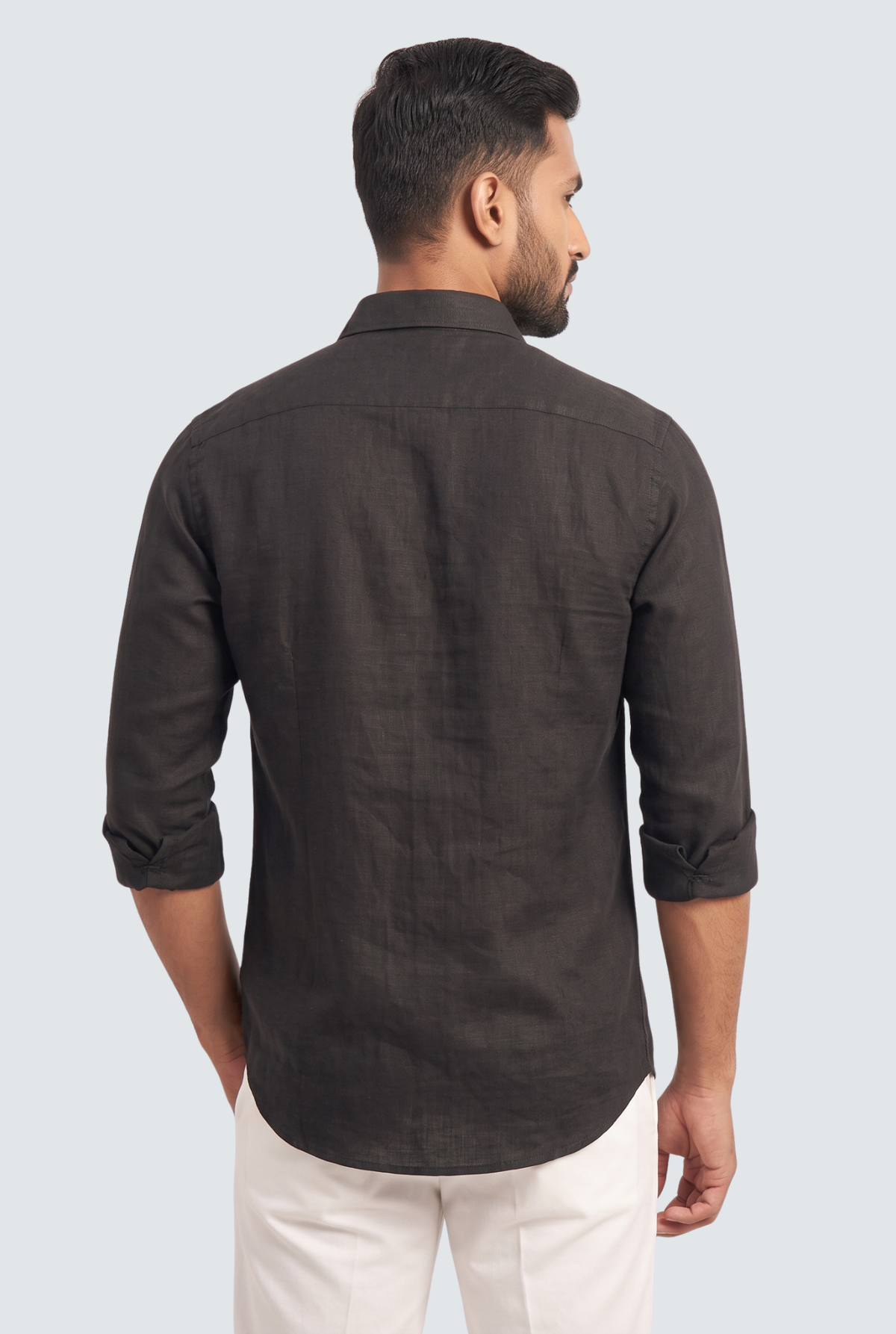 Back view of black linen button-up shirt with collar and long sleeves