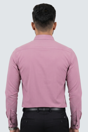 Pink button-up dress shirt back view with long sleeves and buttoned cuffs