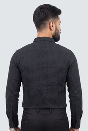 Black textured button-up shirt with long sleeves and full back view
