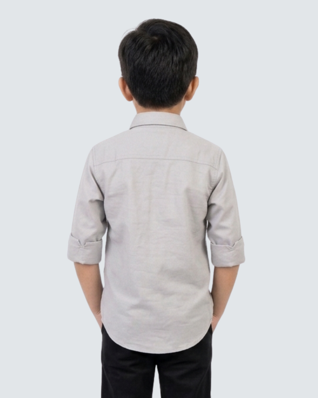 Boys' grey cotton button-up shirt, back view with yoke and folded sleeves