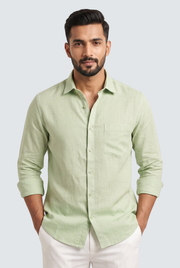 Light green linen button-up shirt with chest pocket and long sleeves