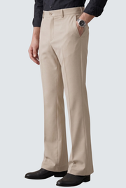 Fawn bootcut trousers with side seams, belt loops, and slanted front pockets