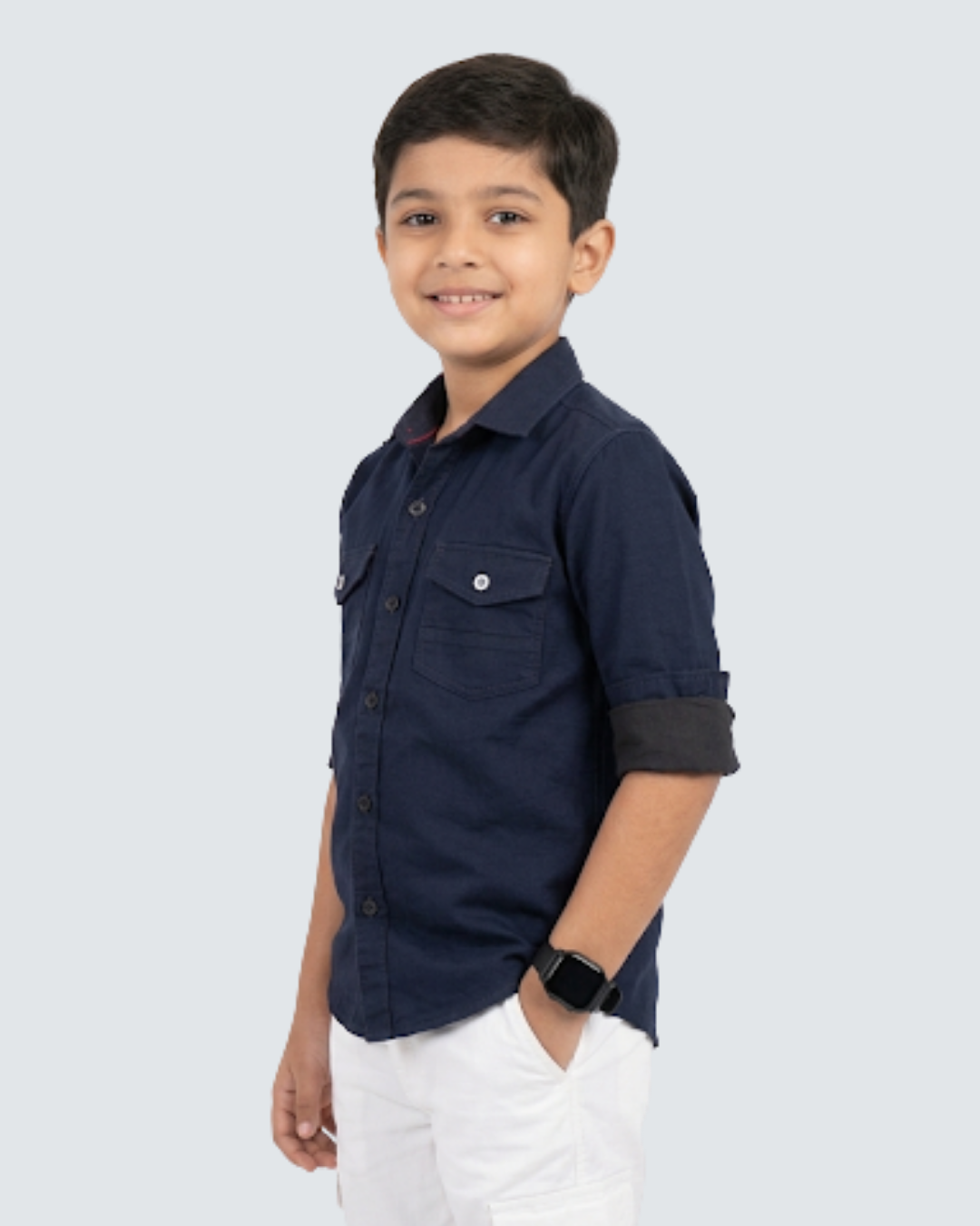 Boys' dark blue cotton shirt with button-front and chest pockets, rolled sleeves