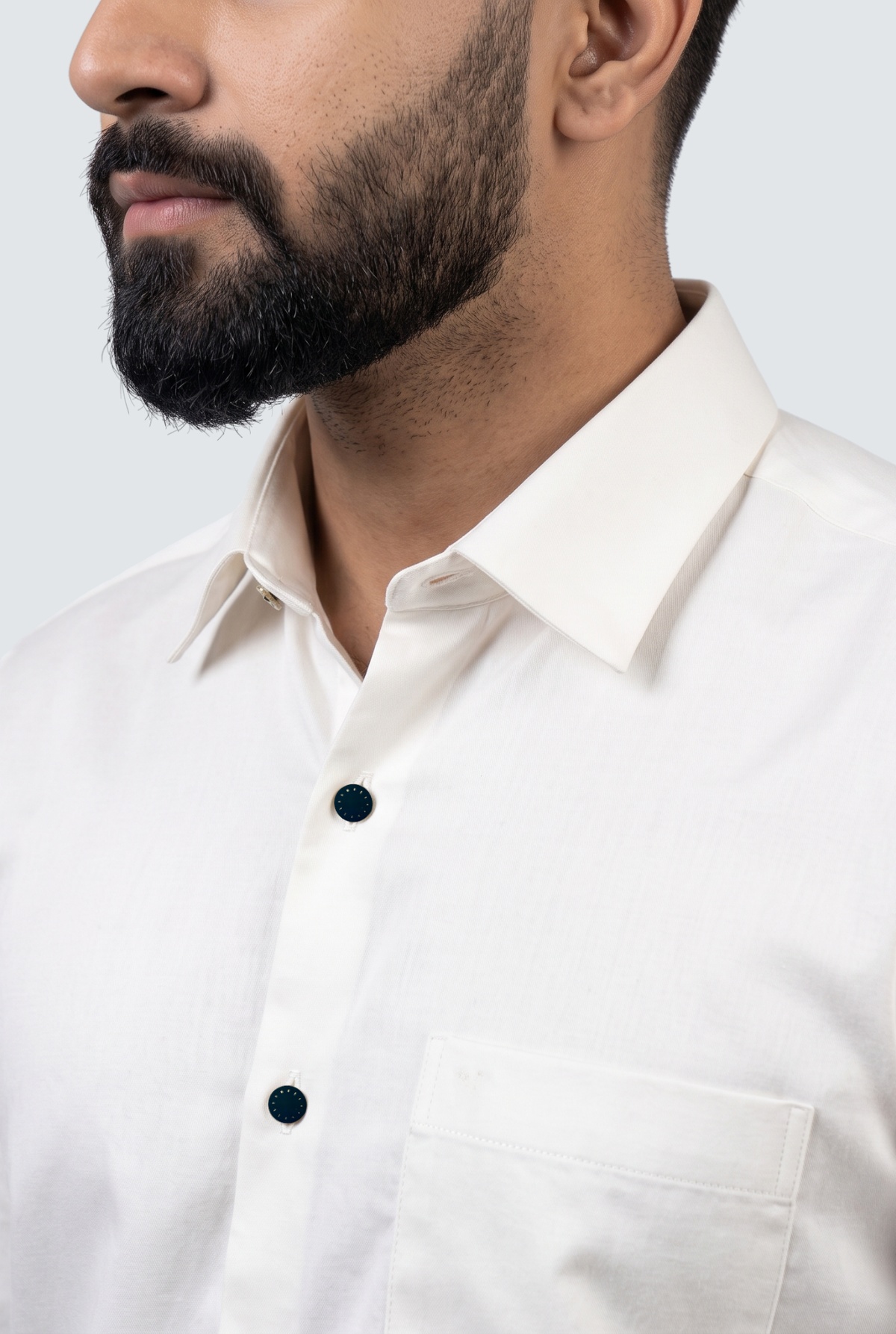 Men's white button-front shirt with collar and chest pocket