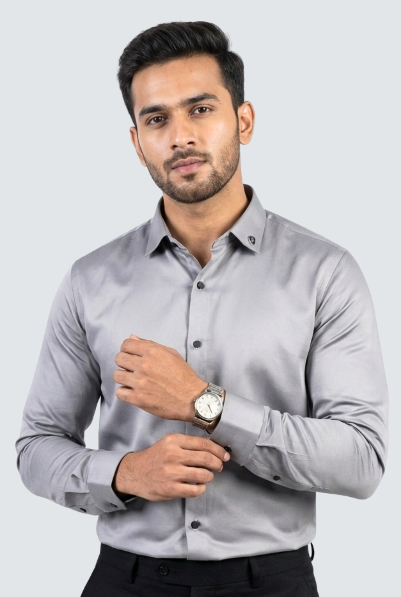 Man wearing a gray shirt with a white background