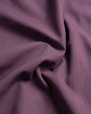 Lavender cotton shirt fabric, draped close-up with smooth weave