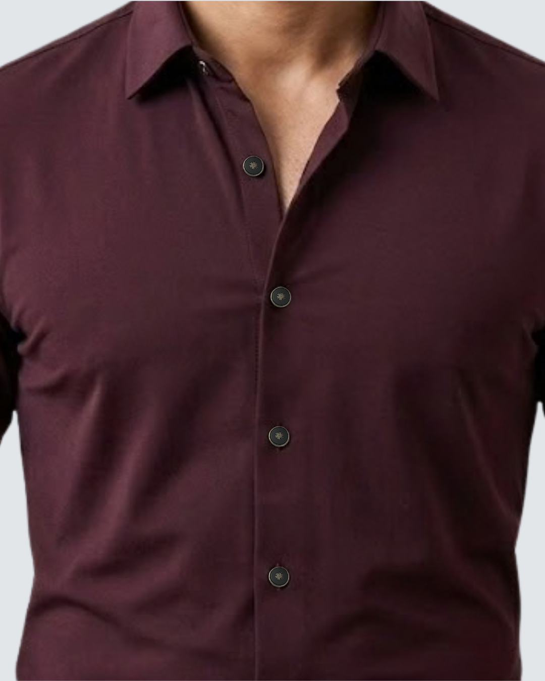 Maroon dress shirt close-up with pointed collar and dark front buttons