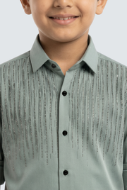 Kids mint green collared shirt with vertical striped texture and black button placket