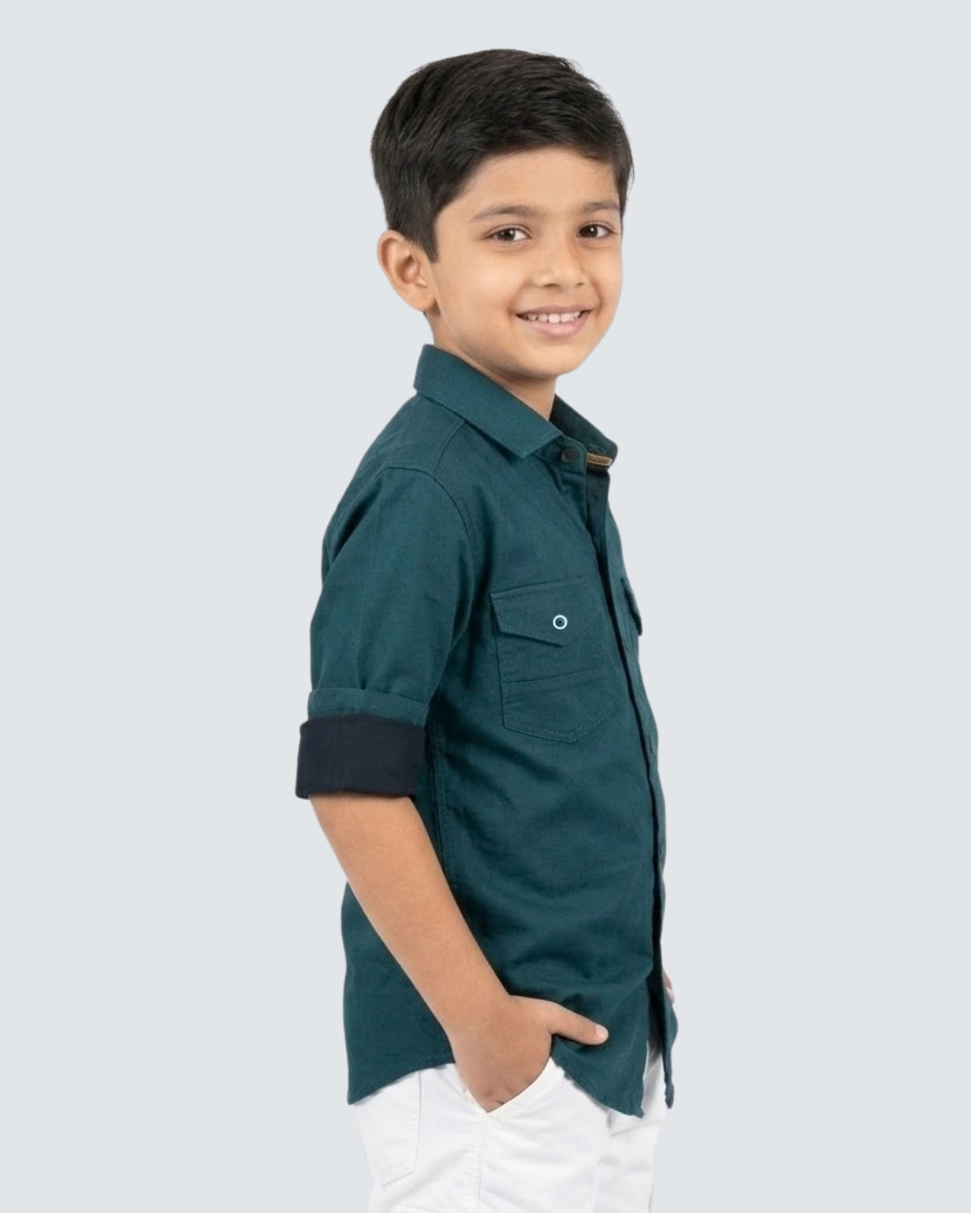 Boys teal cotton button-up shirt with short sleeves and two chest pockets