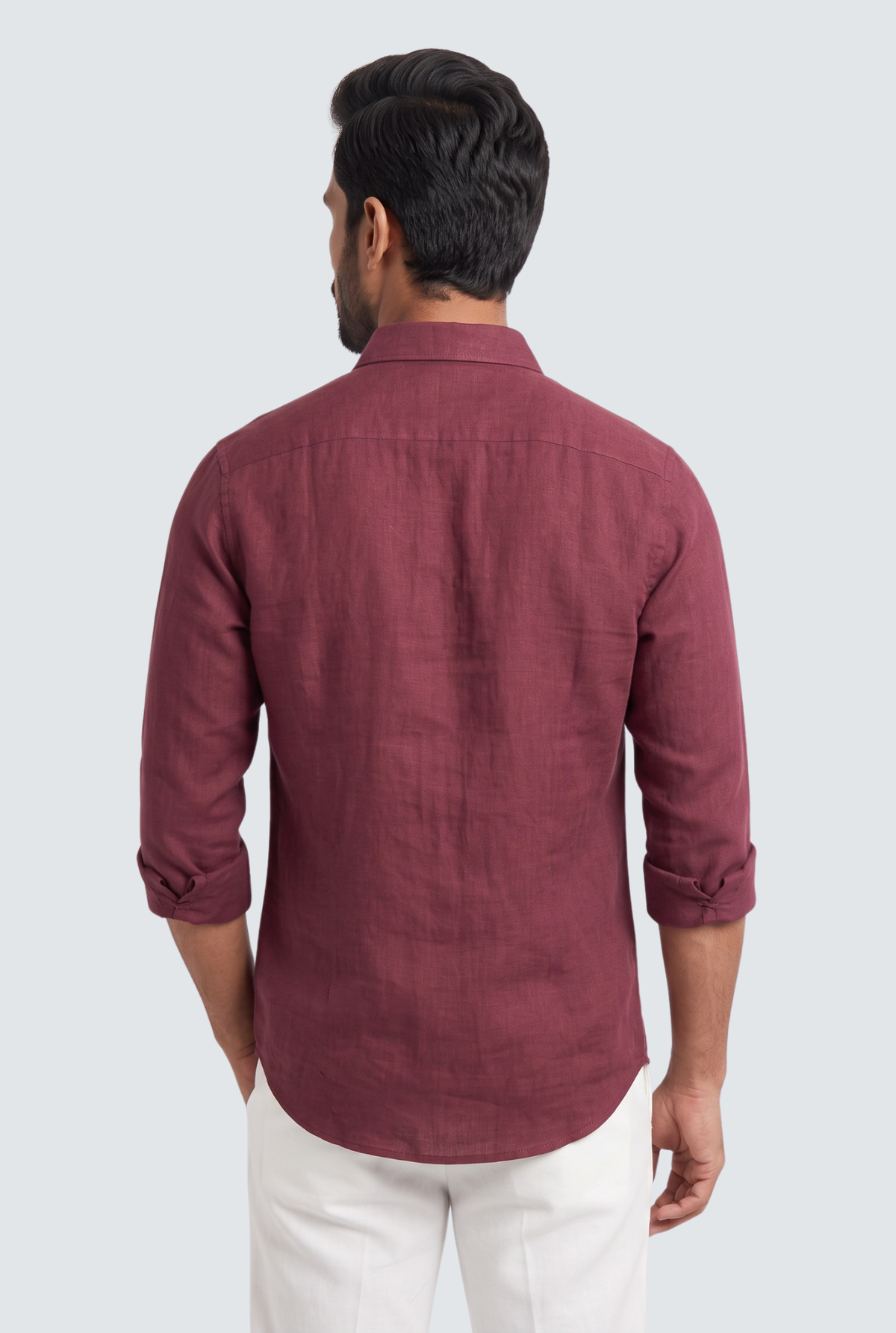 Back view of maroon linen button-up shirt with stand collar and button cuffs