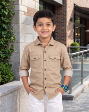 Fawn boys cotton button-up shirt with chest pockets worn with white cargo pants