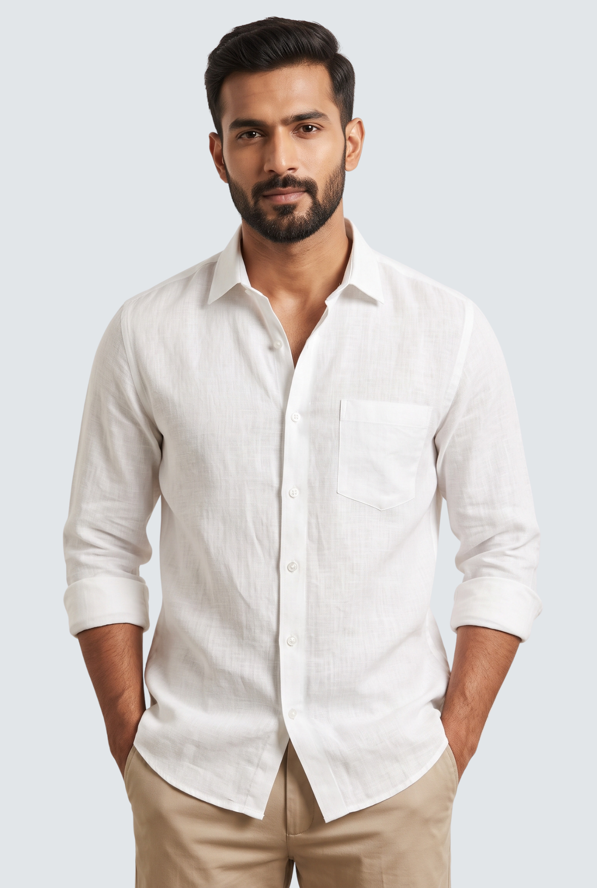 White linen button-up shirt with chest pocket, folded sleeves, buttoned collar.
