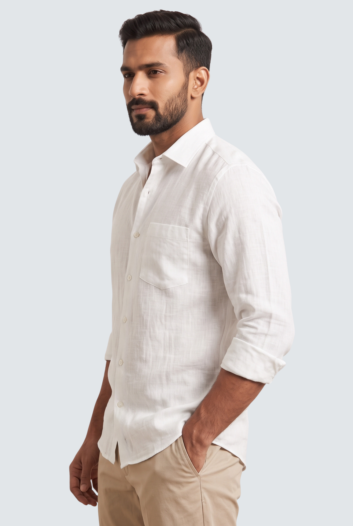 White linen button-up shirt, side view with chest pocket and buttoned cuff.