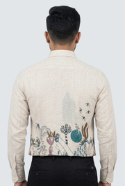 Back view of men's light beige button-up shirt with nature artwork print